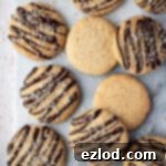 Close up of vegan coconut cookies on a marble board.