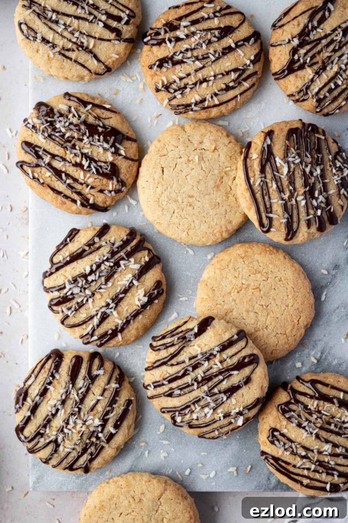 Close up of vegan coconut cookies on a marble board.