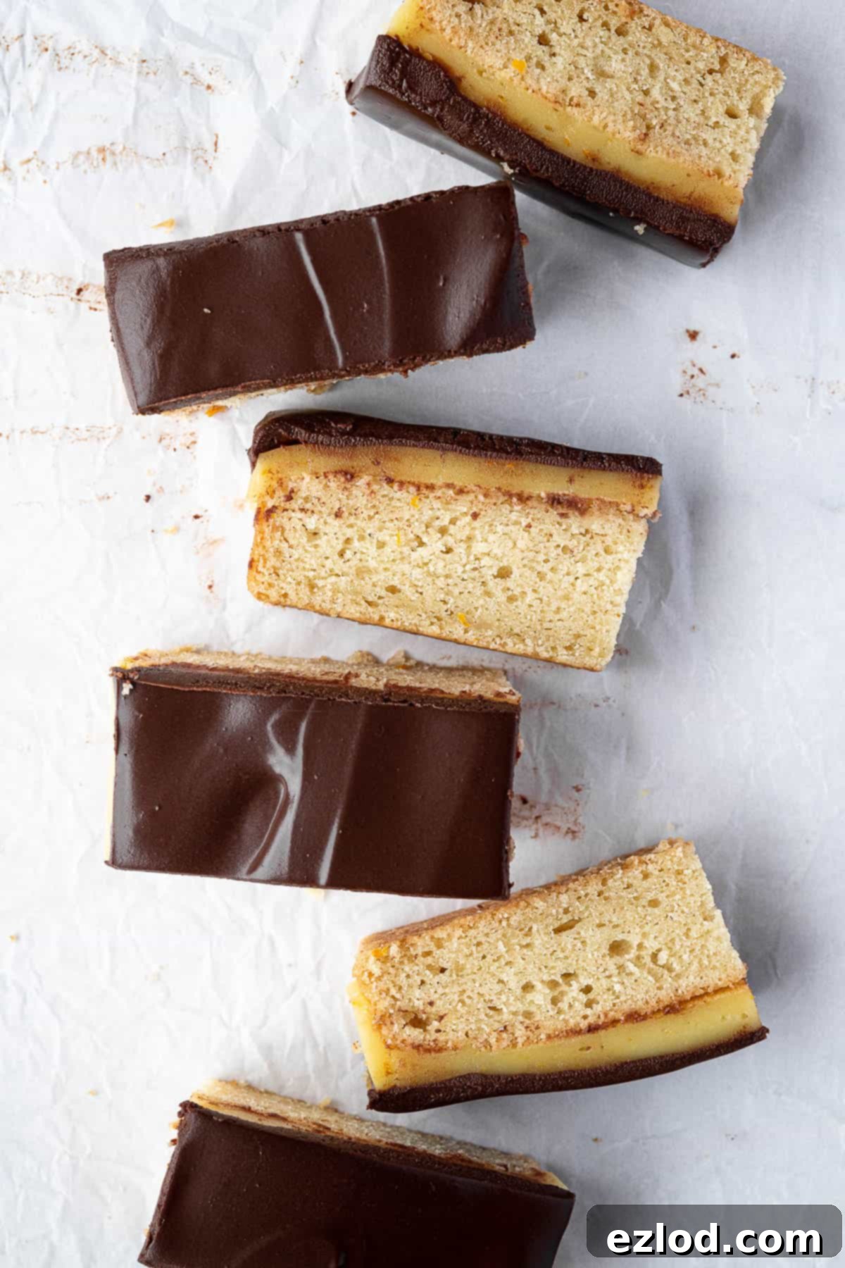 Vegan jaffa cake bars arranged in a line.