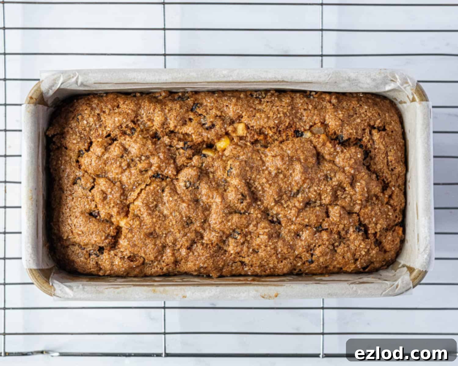 Step 5: The baked vegan fruit cake loaf, golden brown and perfectly risen, fresh out of the oven.