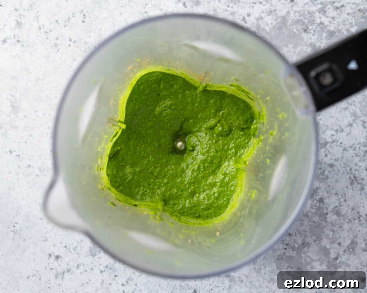 Step 2: A close-up of the bright green, smooth herb paste after blending.