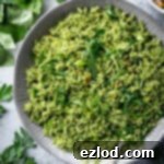 Close up of a bowl of herby green rice.