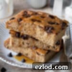 A stack of sheet pan banana pancakes on a plate.
