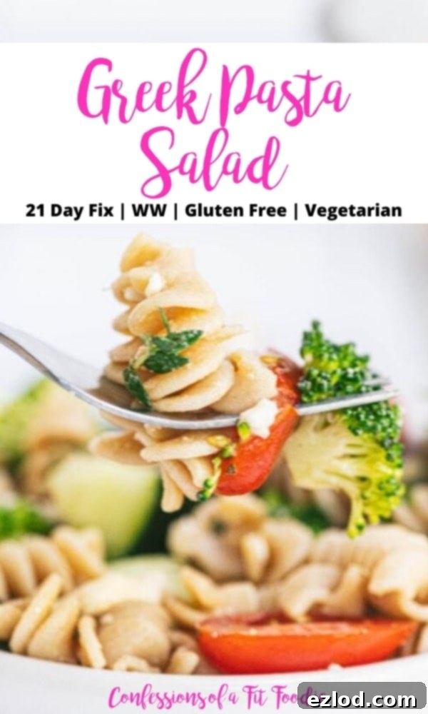 Close up photo of a fork with Greek pasta salad and a black and pink text overlay- How to Make Pasta Salad | 21 Day Fix | WW | Gluten Free | Vegetarian | Confessions of a Fit Foodie