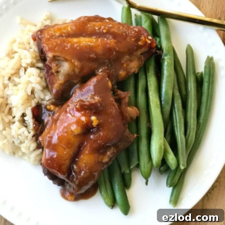 Instant Pot Asian Chicken Thighs served with a side of brown rice and green beans