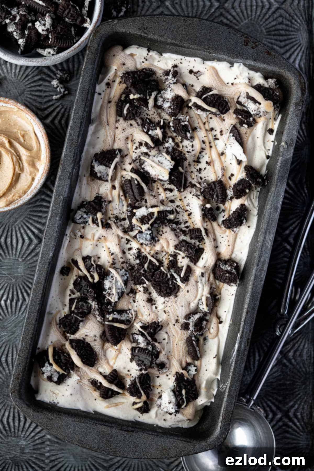 No-churn peanut utterr Oreo ice cream in a loaf tin.