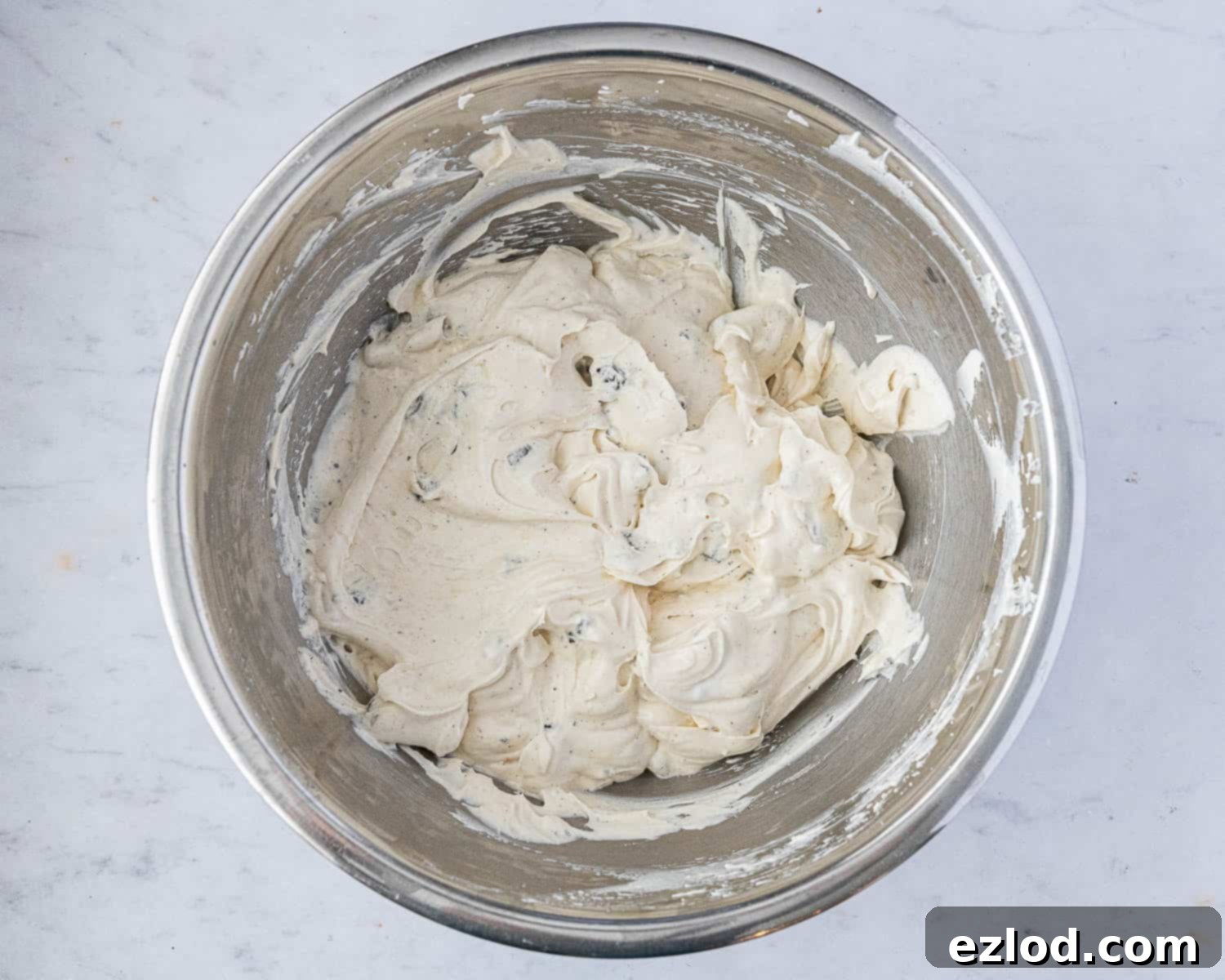 Step 3, the cream with the Oreos folded in.