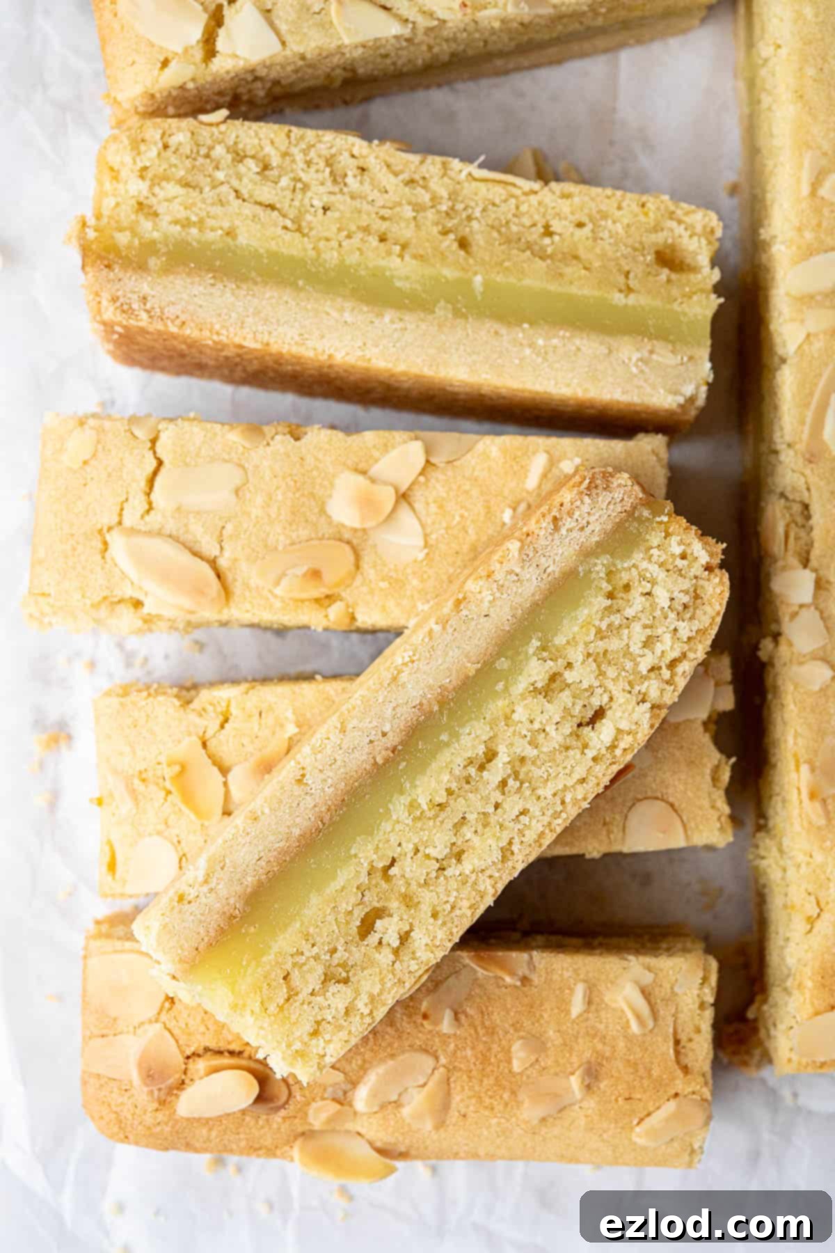 Zesty Vegan Bakewell Bliss 12 Close up of the lemon Bakewell bars, showcasing their golden top and appealing texture.