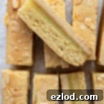Zesty Vegan Bakewell Bliss 13 Close up of a vegan lemon Bakewell slice.