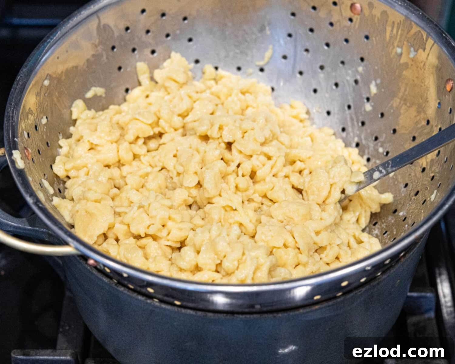 Step 5, the cooked spaetzle in a colander.