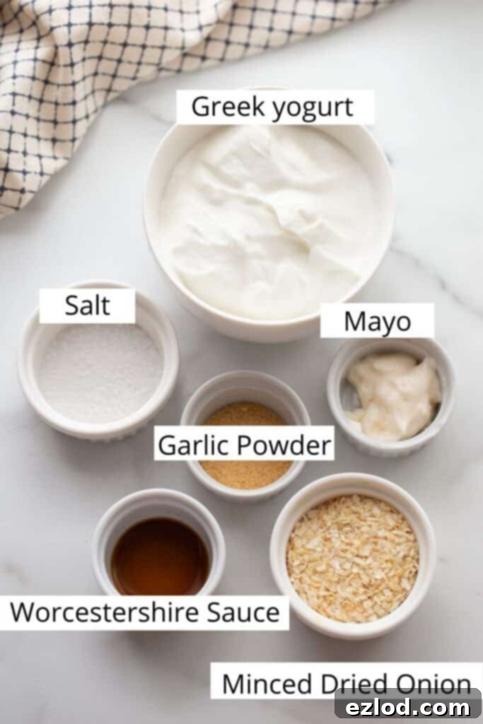 Creamy Greek Yogurt French Onion Dip 3 Collection of fresh ingredients for homemade Greek Yogurt French Onion Dip, including Greek yogurt, mayo, minced dried onions, and garlic powder.