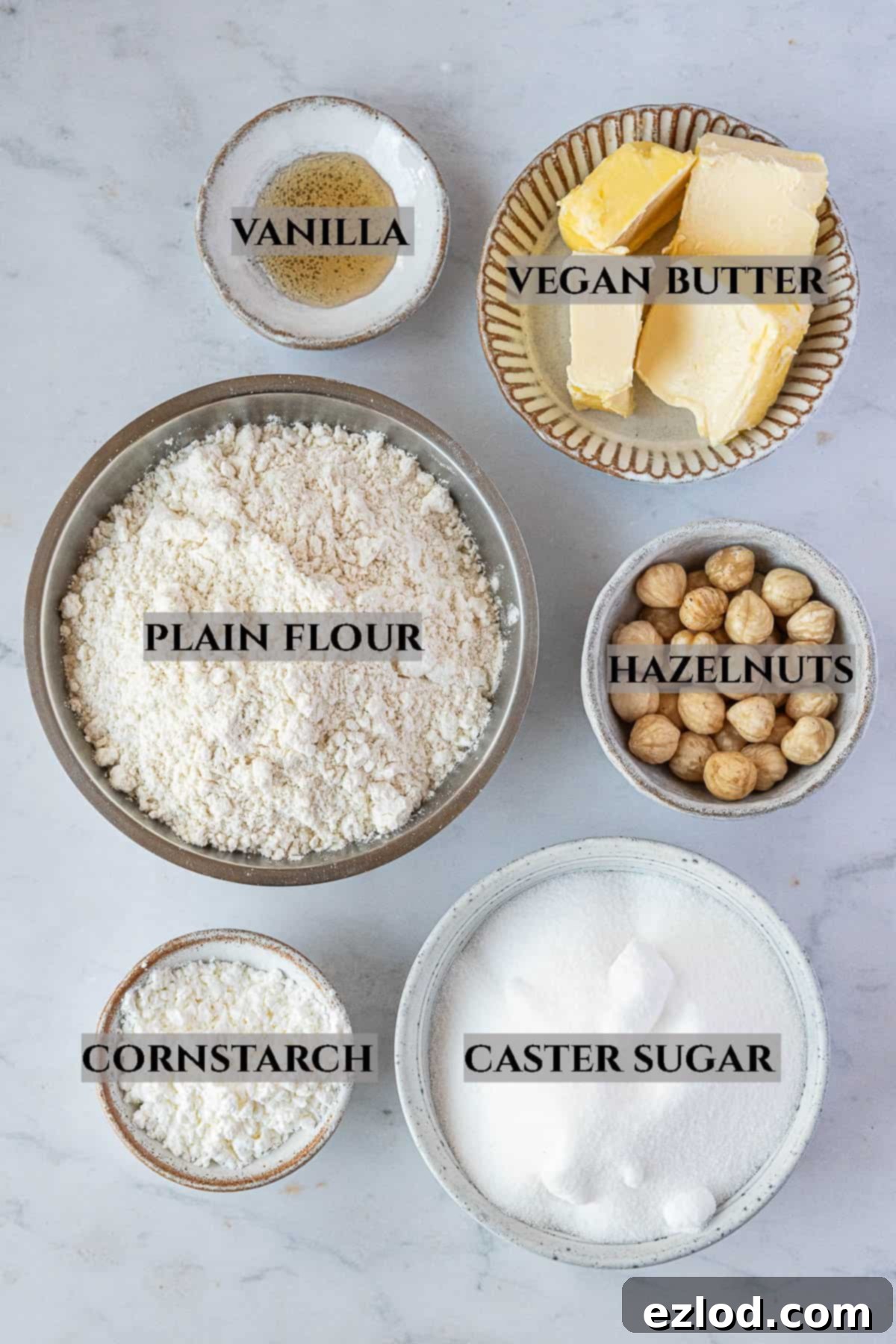 A photo of the ingredients needed to make hazelnut shortbread, with labels.