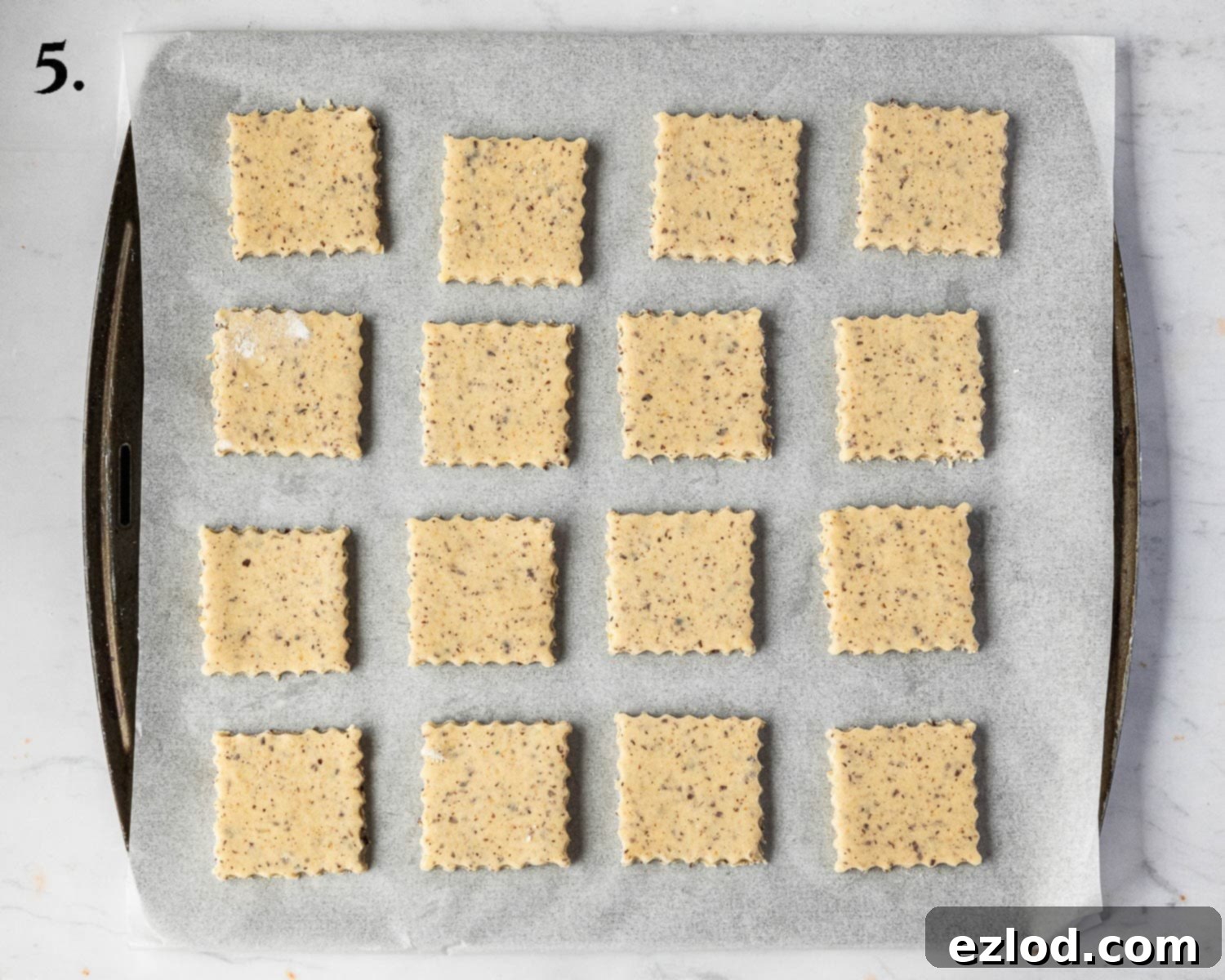 Step 5, the cookies on a baking sheet before baking.