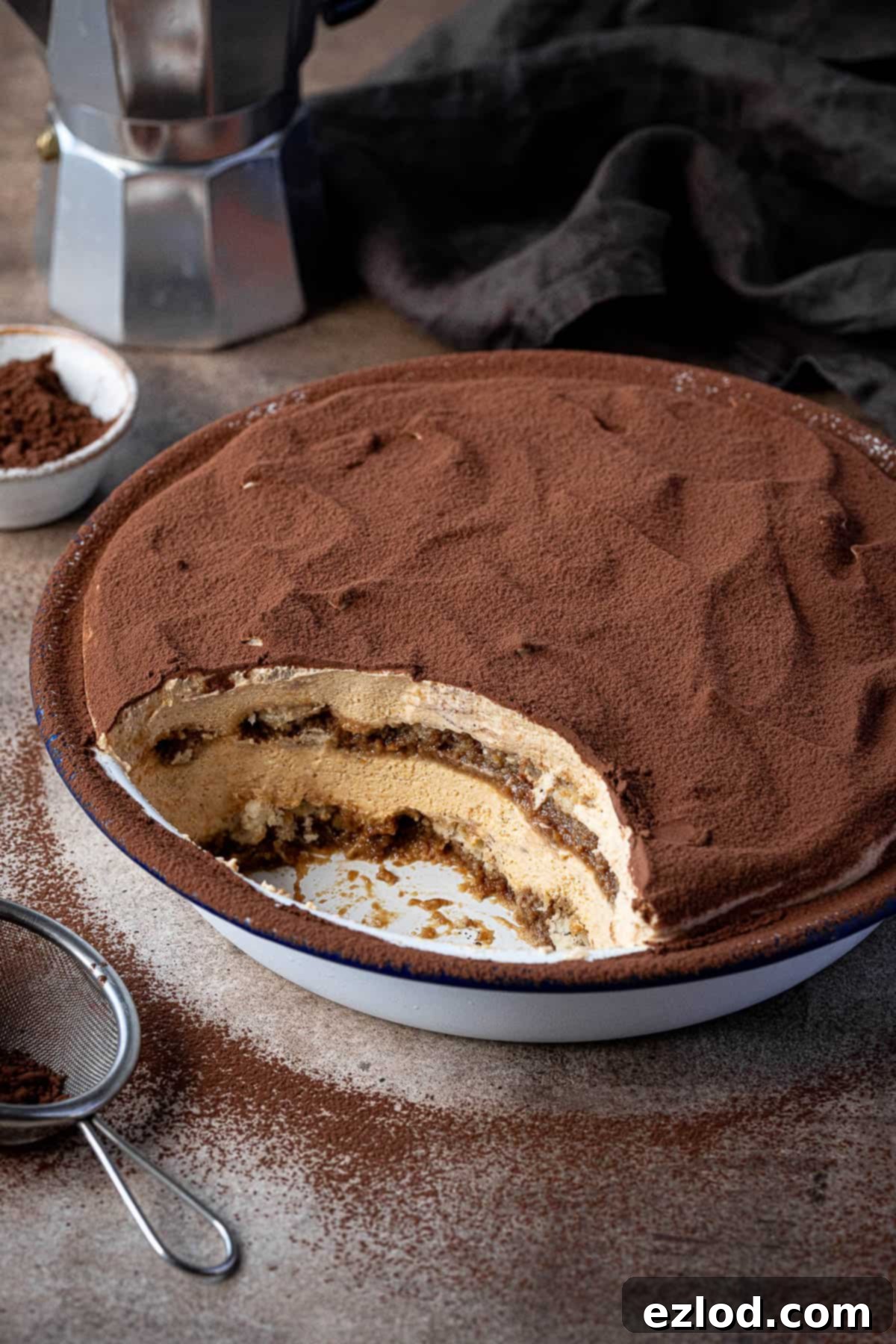 Close up of the pumpkin tiramisu with a spoonful removed.
