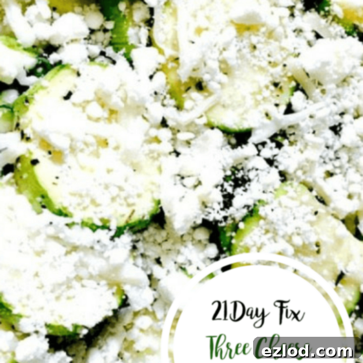 Three cheese zucchini bake with melted cheese and fresh herbs