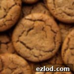 Close up of a pile of chewy vegan ginger cookies.