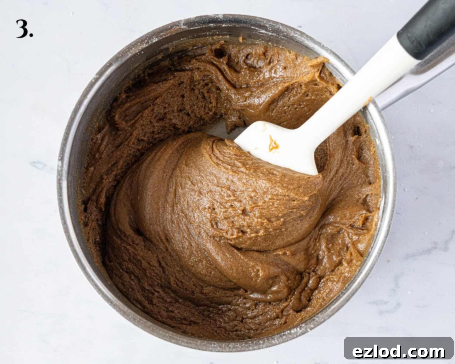 Step 3 in the baking process: a close-up of the fully mixed, soft dough, ready for shaping.