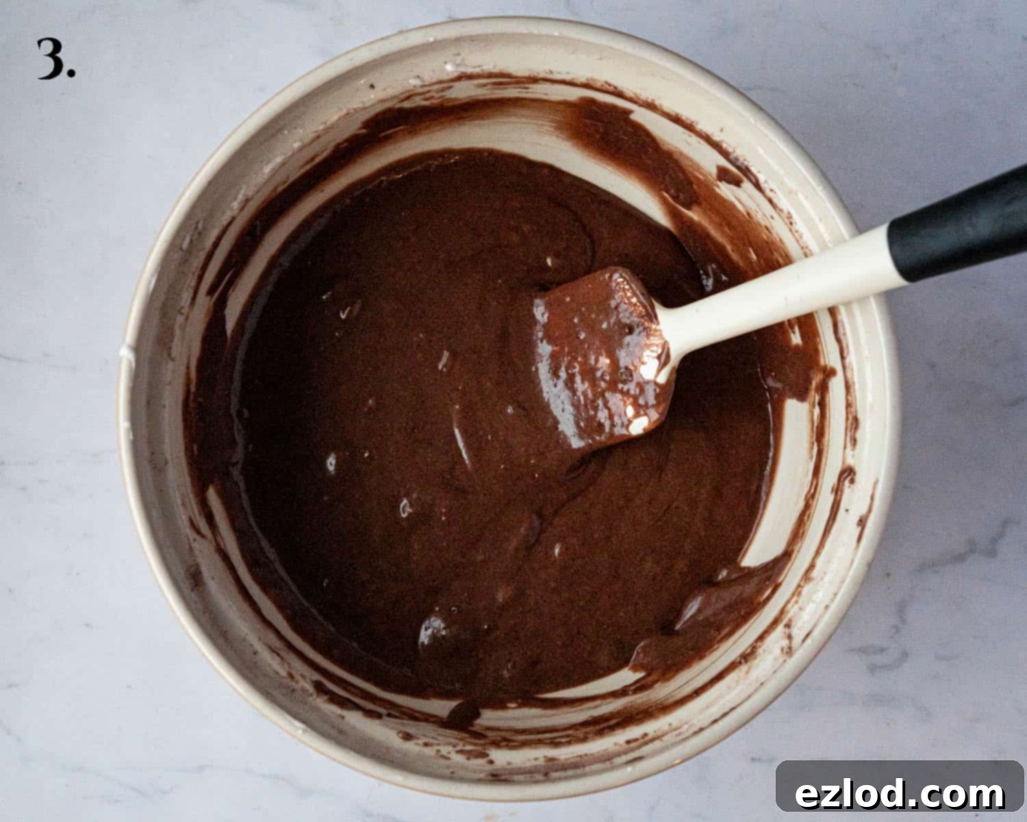 Plant-Based Chocolate Yule Log 7 Step 3: The completed batter for the vegan yule log, featuring a smooth and homogenous texture after all wet and dry ingredients have been gently folded in.