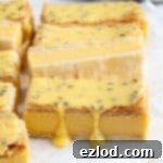 Close up of the vegan vanilla slices topped with passion fruit glaze.