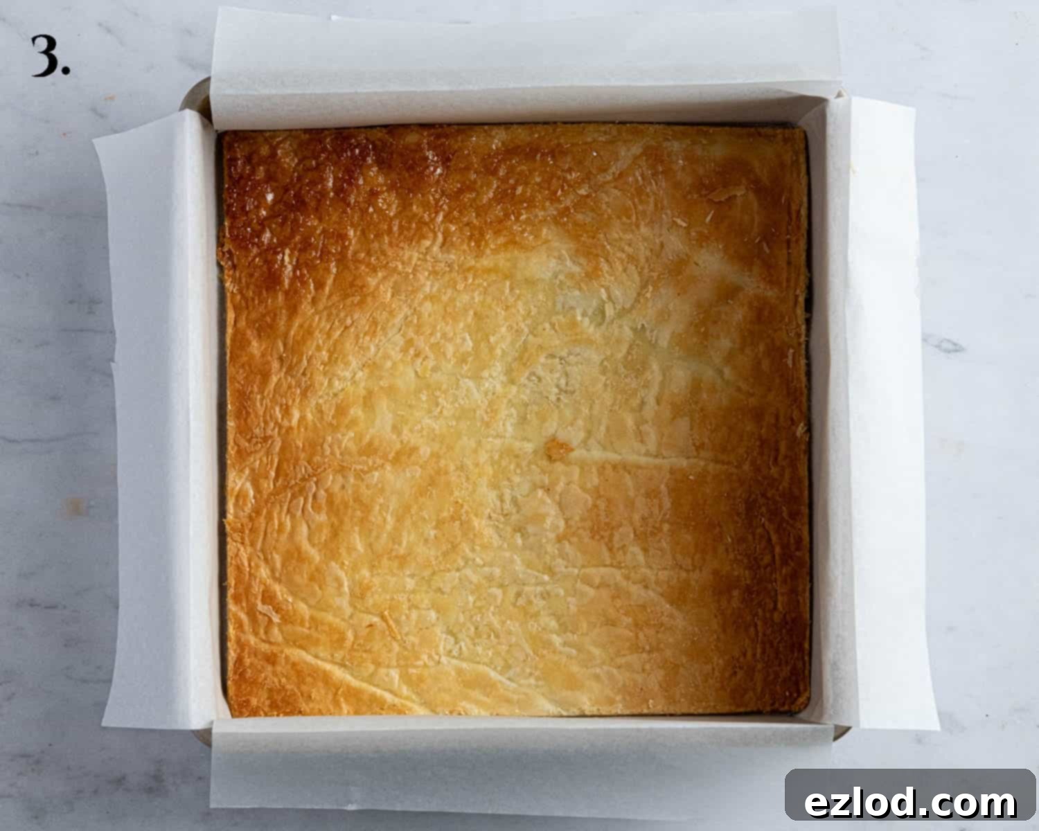 Step 3, the pastry square in the tin.