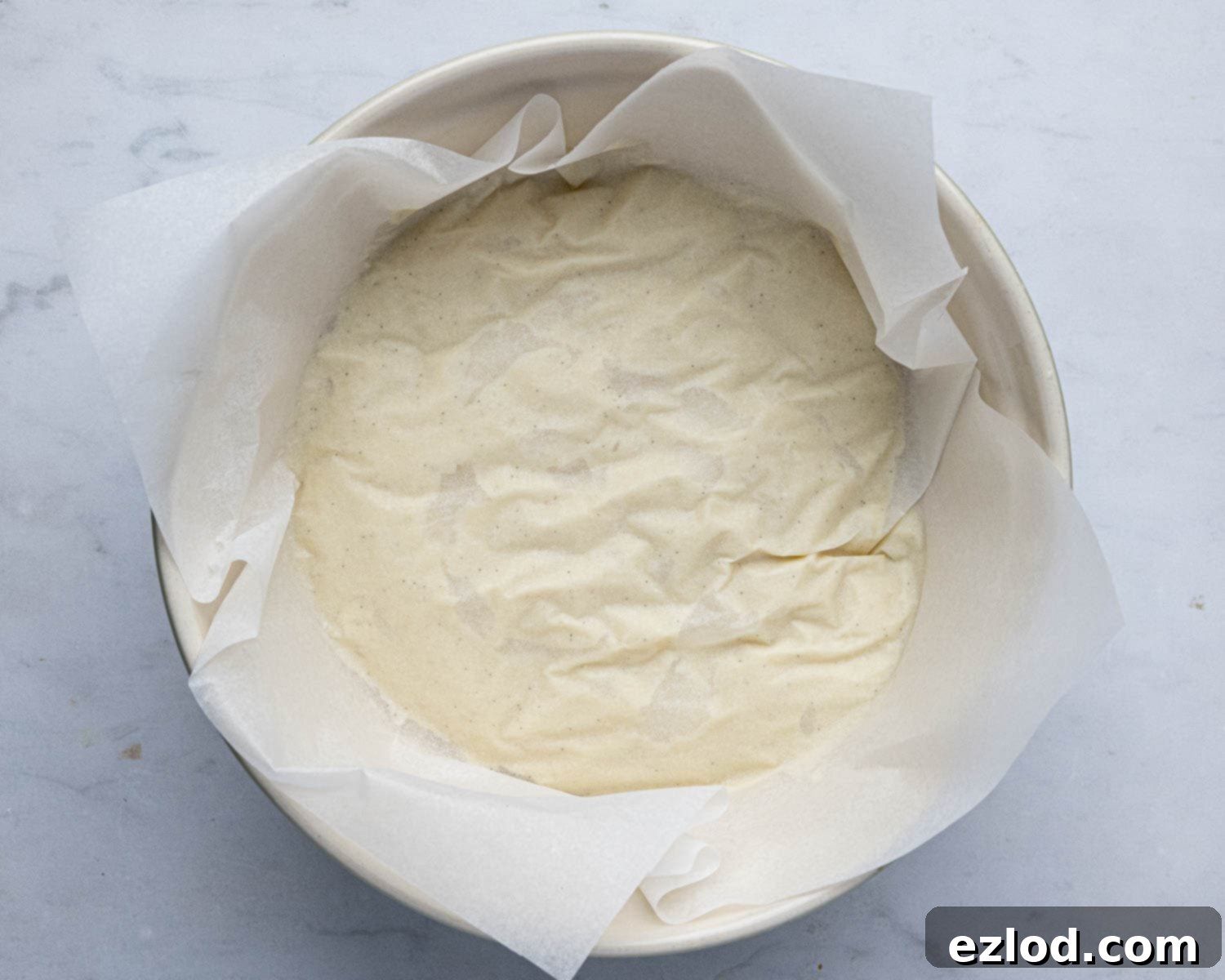 Step 3: Pastry cream in a bowl, covered with baking paper to prevent a skin from forming.