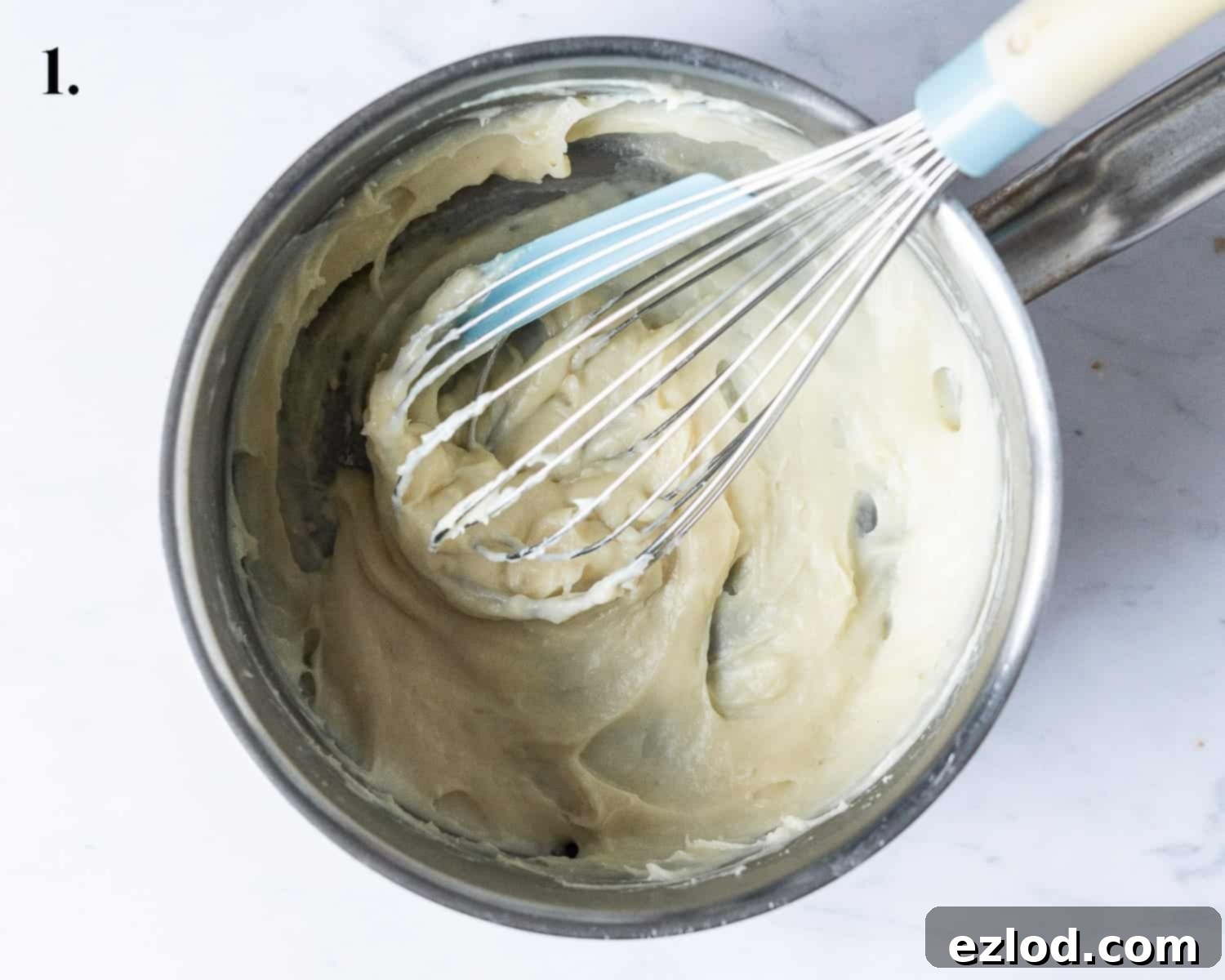 Step 1: The tangzhong mixture cooking in a saucepan, thickening into a paste.