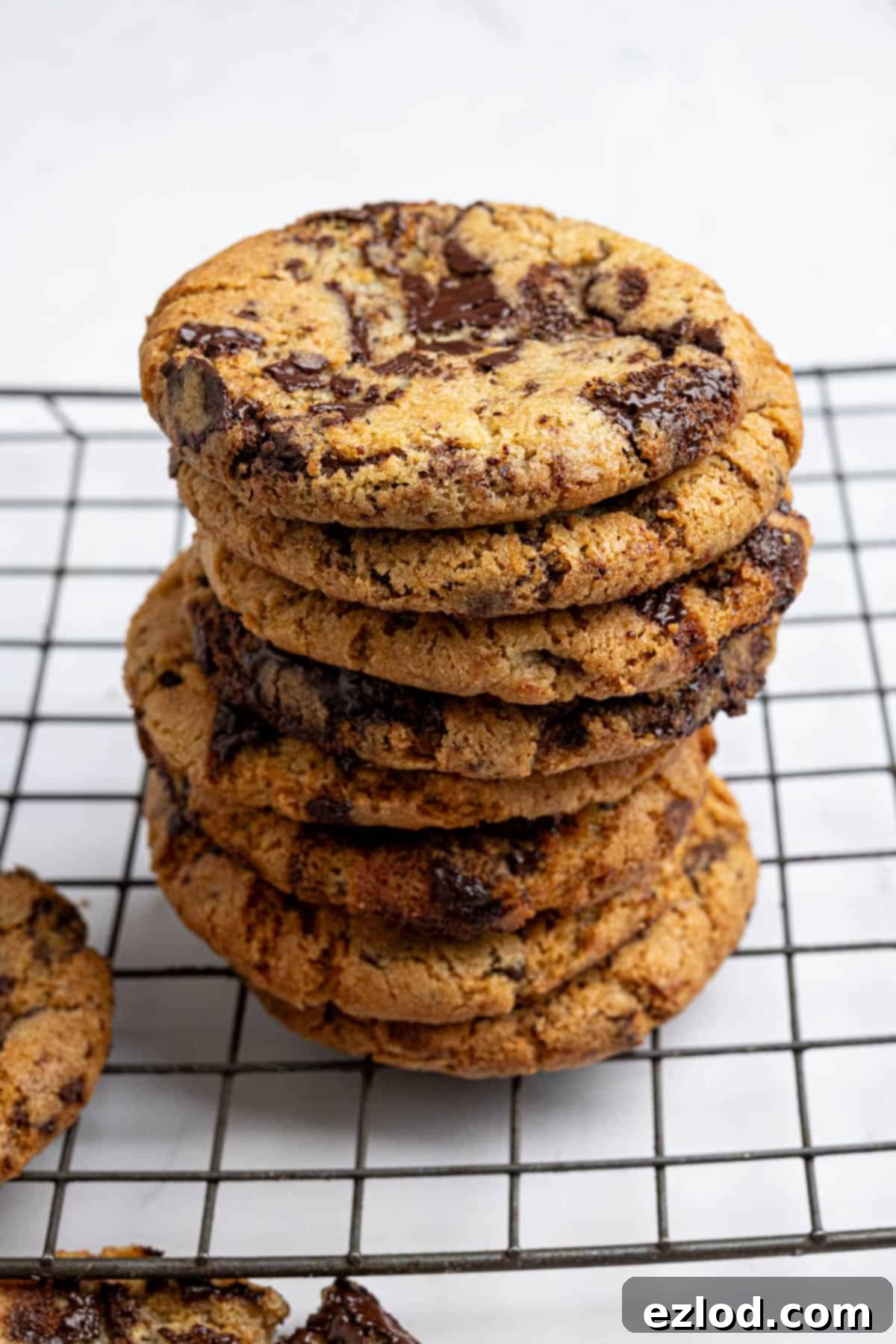 A beautifully stacked pile of freshly baked vegan air fryer chocolate chip cookies.