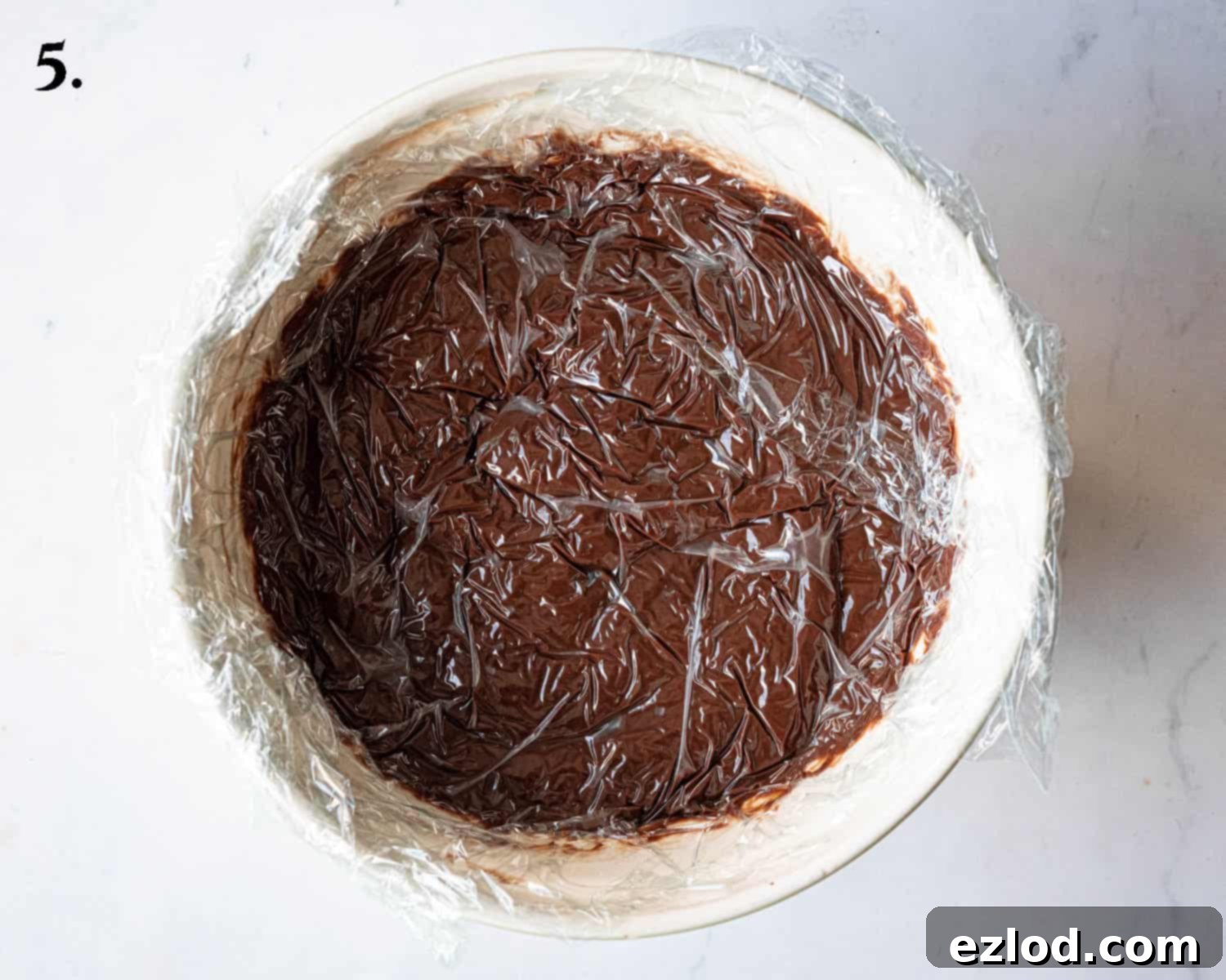 Step 5, the pastry cream covered with clingfilm.