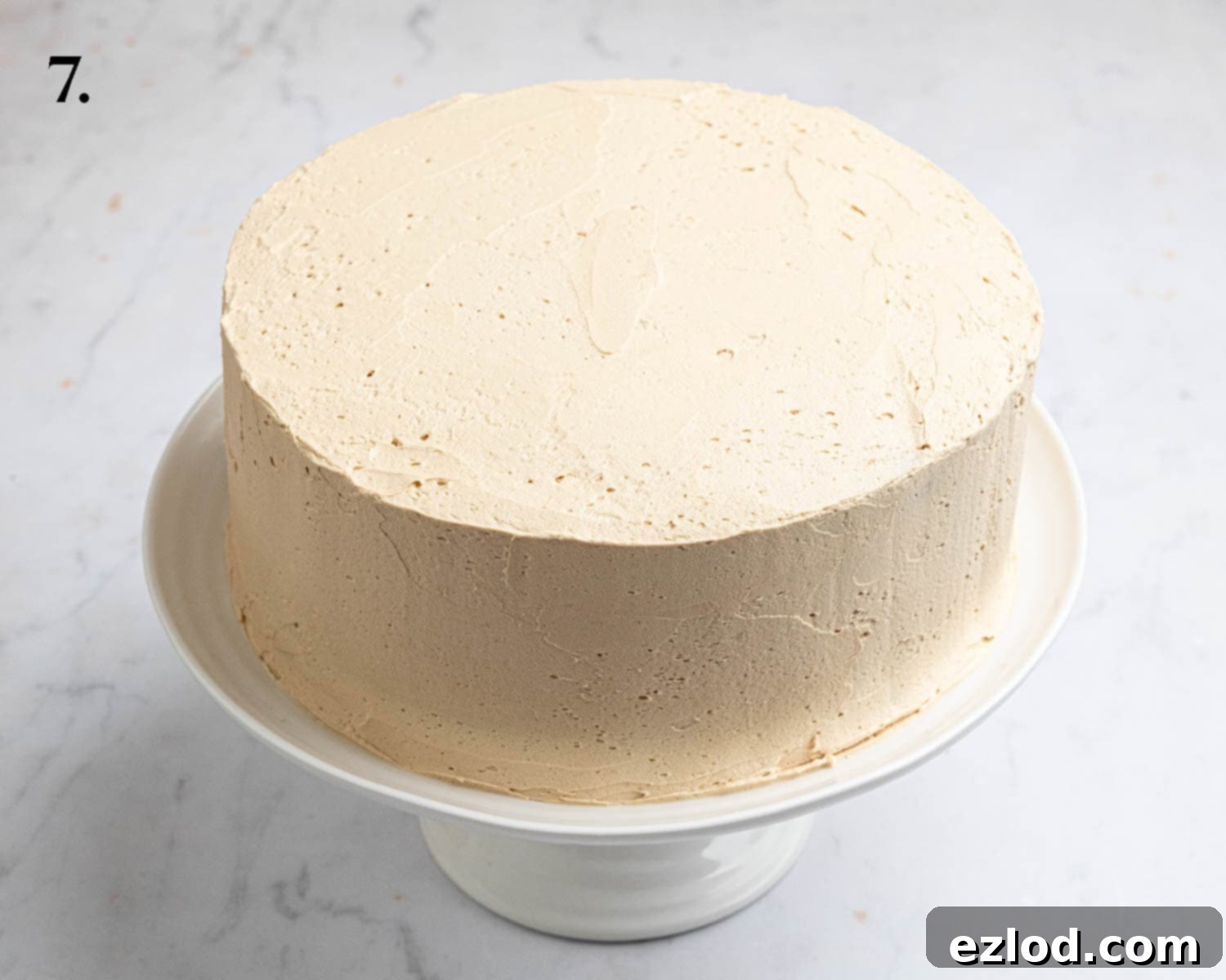 Step 7, the buttercream coated cake.