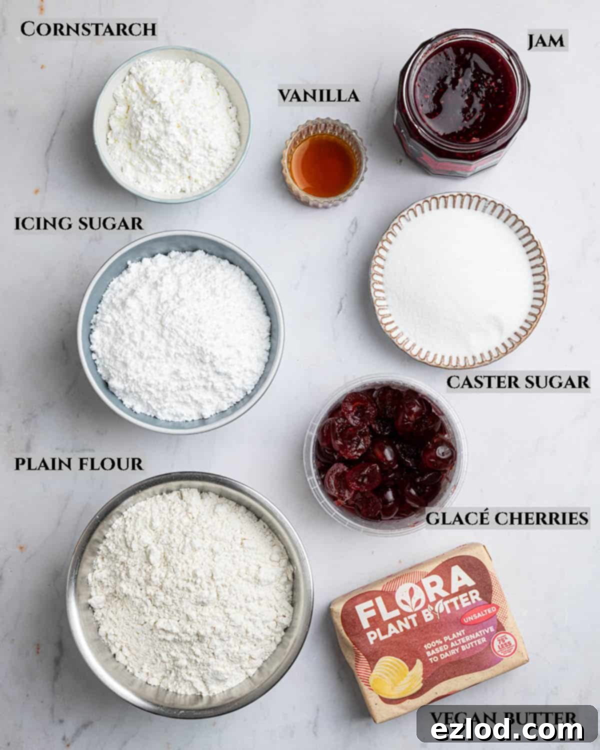 A labelled photo of the ingredients needed to make vegan empire biscuits.