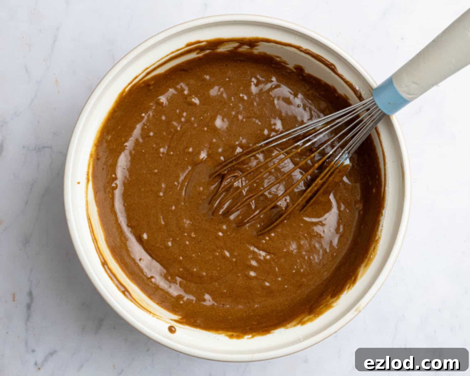 Step 2: The finished vegan gingerbread muffin batter in a bowl, after dry ingredients have been incorporated.