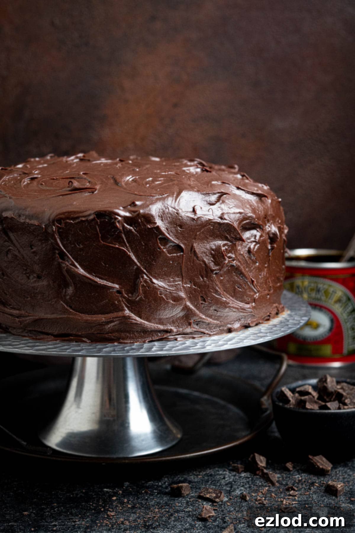 Decadent Vegan Treacle Chocolate Cake 11 Close-up of the fully frosted vegan treacle chocolate cake, showing the rich, smooth chocolate fudge layer.