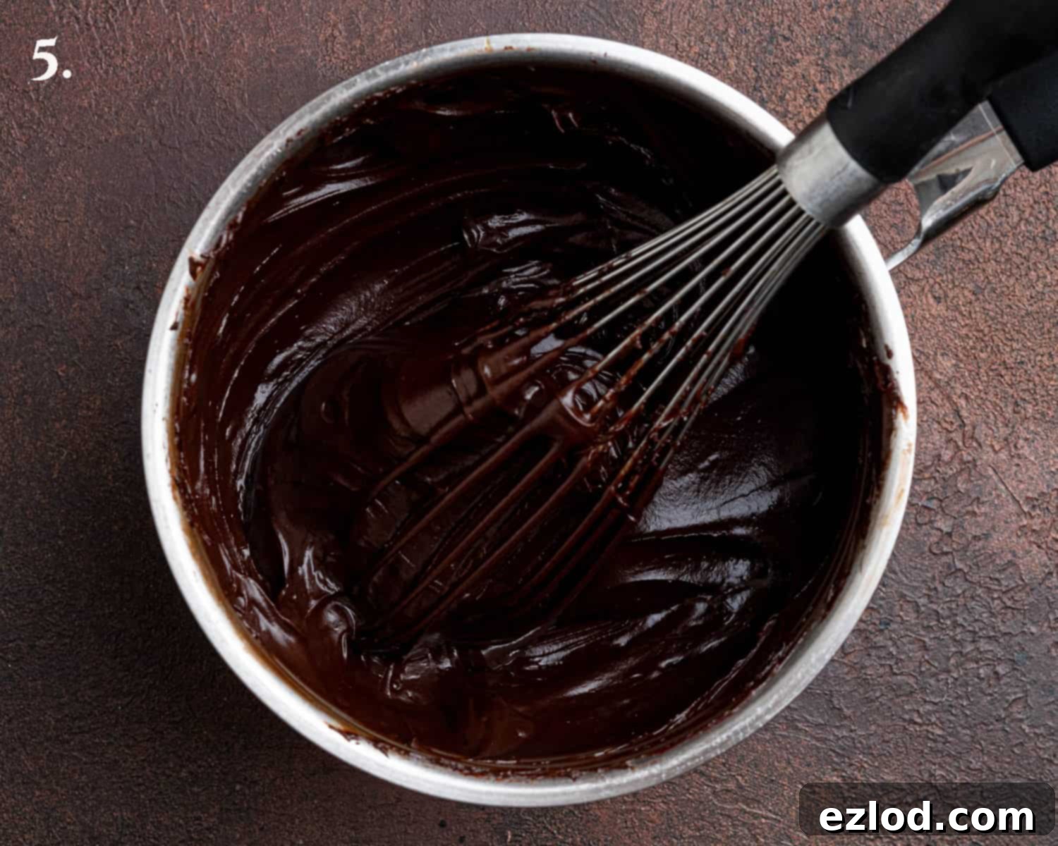 Decadent Vegan Treacle Chocolate Cake 10 Step 5 in making treacle chocolate cake frosting: the finished frosting with melted chocolate and butter, smooth and ready to use.