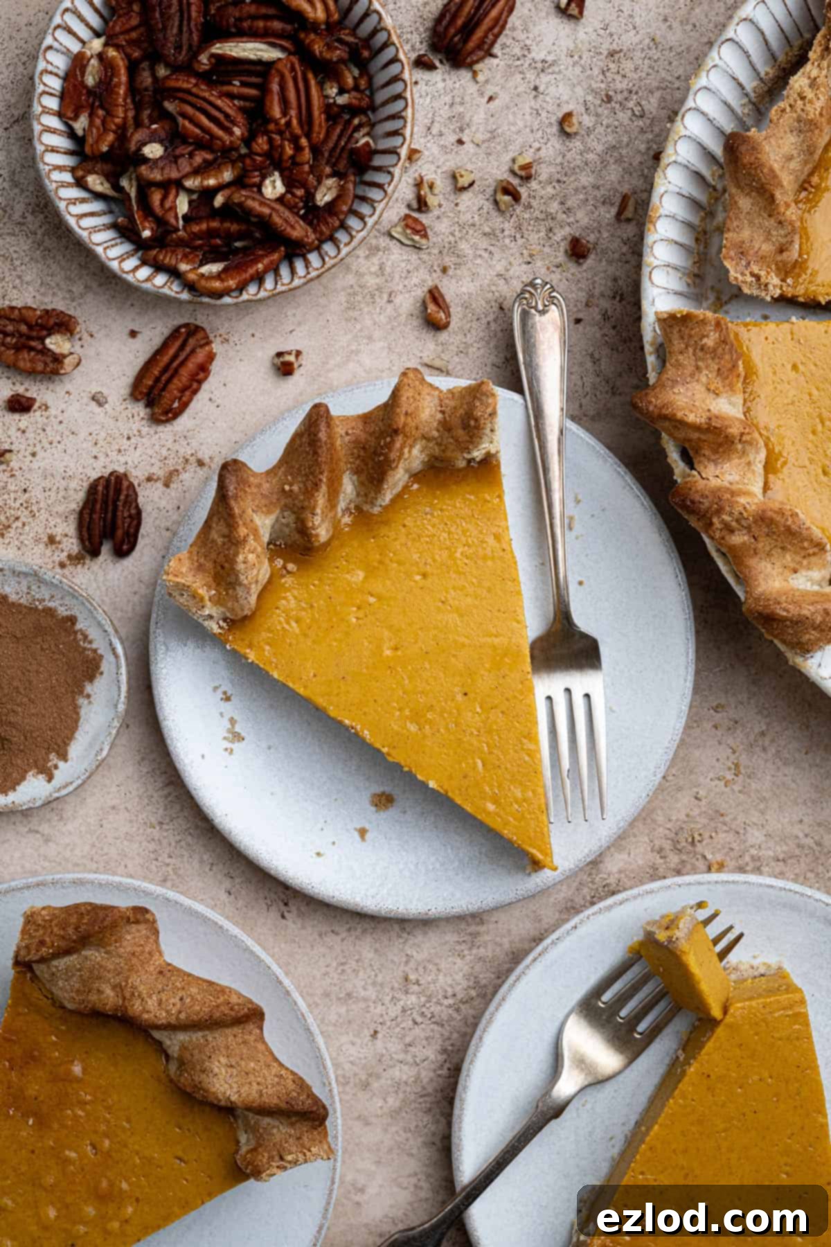 Slices of vegan sweet potato pie on plates.