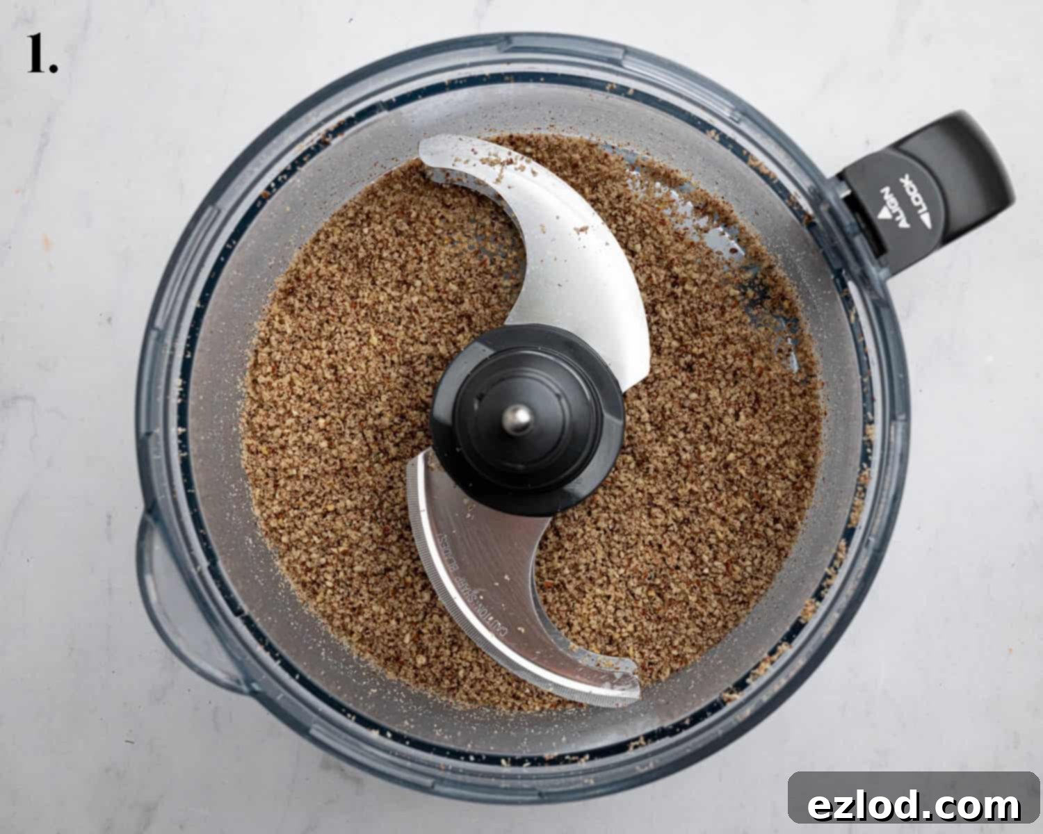 Step 1, ground pecans in a food processor.