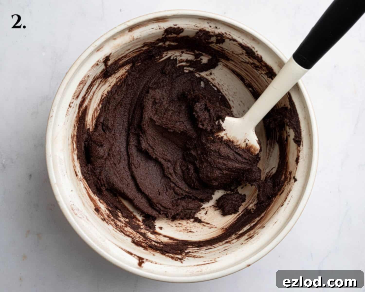 Step 2 in making vegan mint chocolate sandwich cookies: The butter mixture after cocoa powder, baking soda, and salt have been perfectly mixed in.