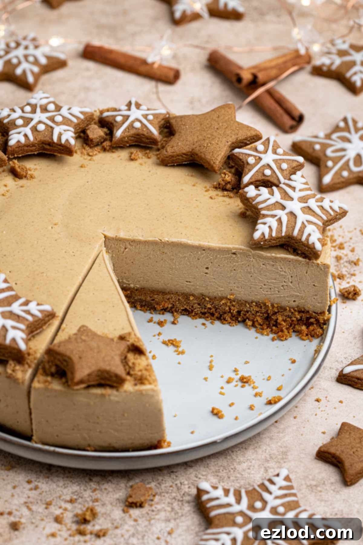 The sliced vegan gingerbread cheesecake on a plate.