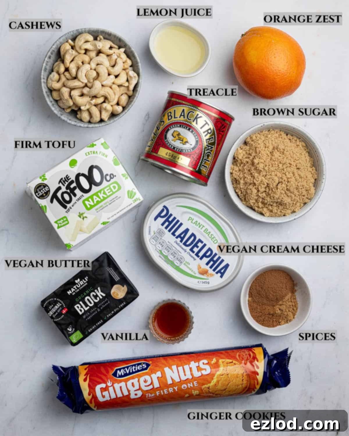 A labelled photo of the ingredients needed to make vegan gingerbread cheesecake.