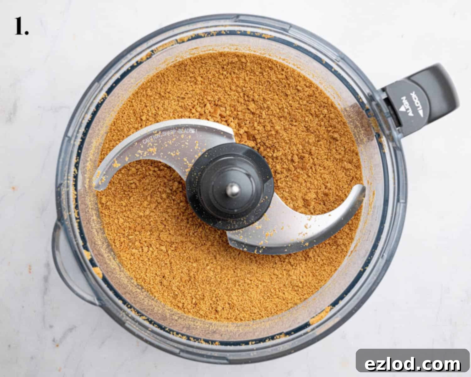 Step 1, the crushed cookies in a food processor.