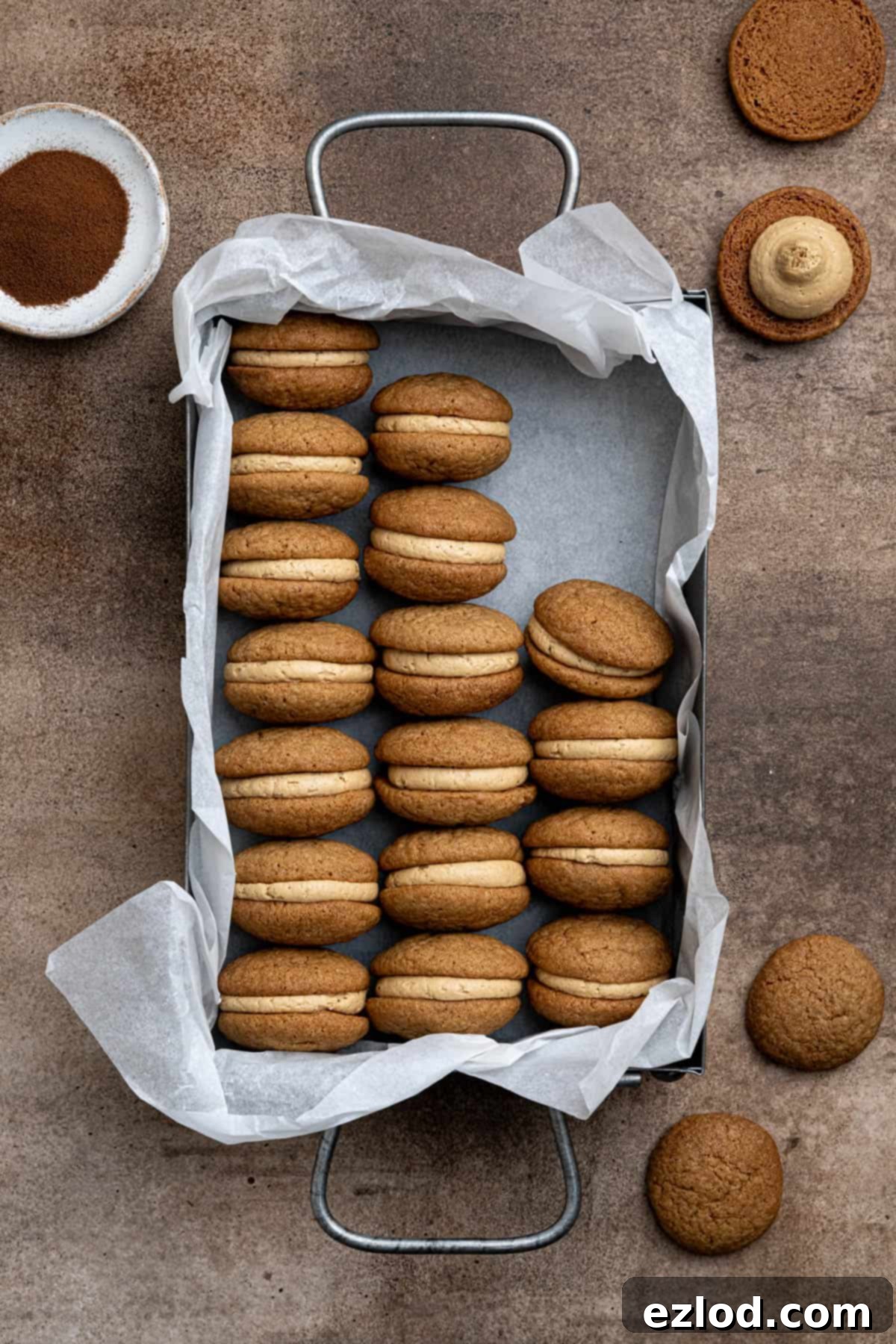 A charming close-up of Vegan Coffee Kisses presented in a parchment-lined metal baking tray, inviting a delightful experience.
