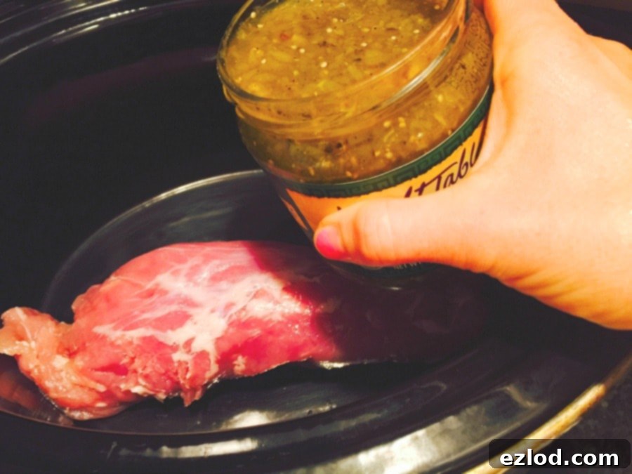 Step 1: Place pork tenderloin in slow cooker.
