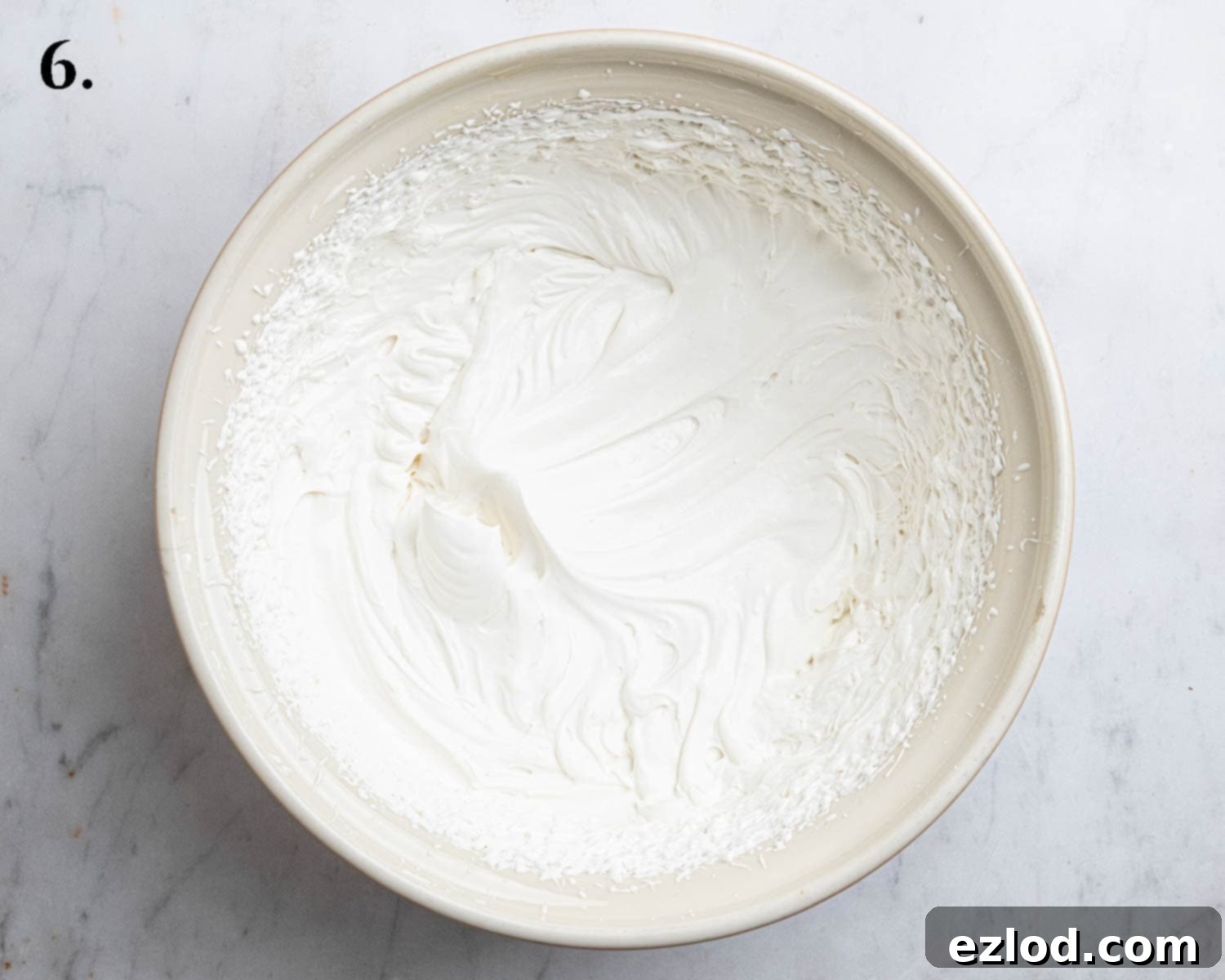 Step 6, the whipped cream.