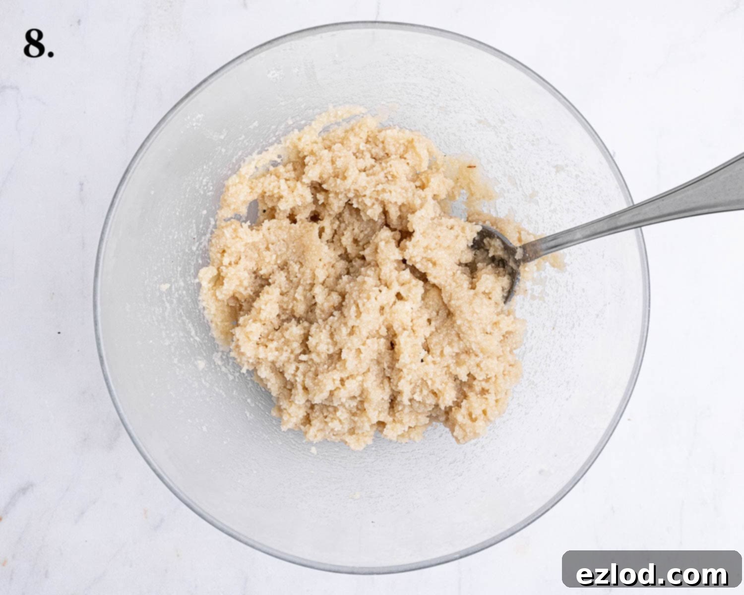 Homemade Vegan Semlor 12 Step 8, the filling mixture in a bowl.