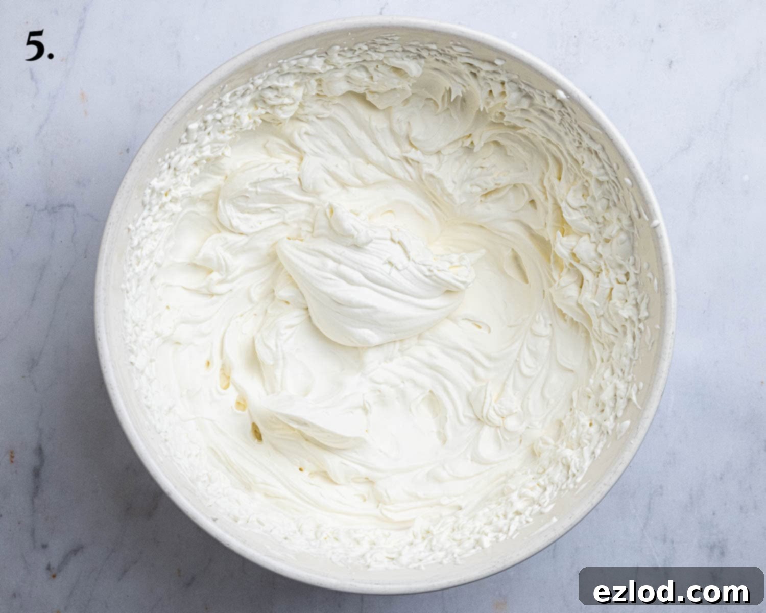 Step 5, the whipped cream in a bowl.