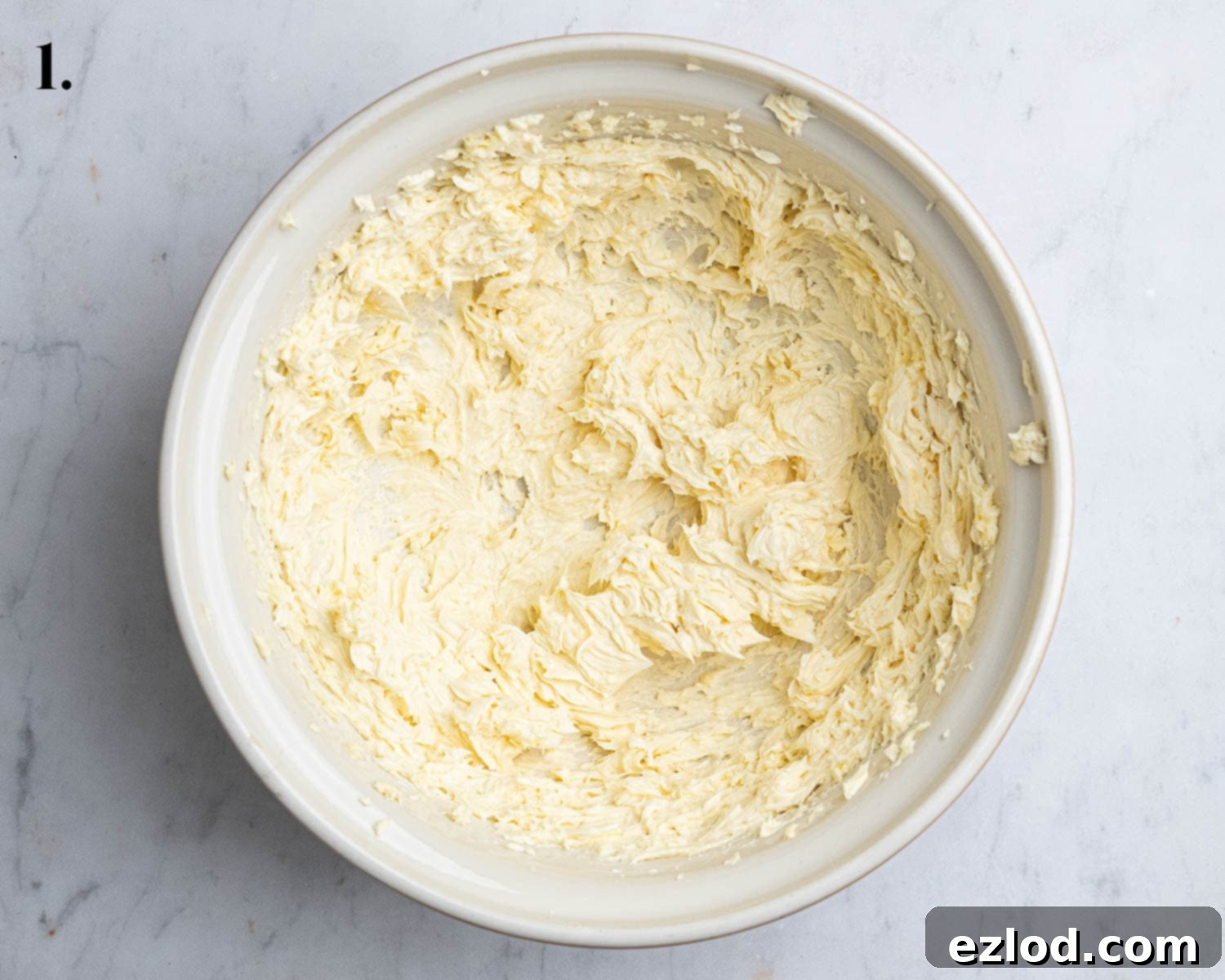 Dairy-Free Viennese Delights 5 Step 1 in making vegan Viennese whirls: The whisked vegan butter, icing sugar, and vanilla extract, creamy and smooth.