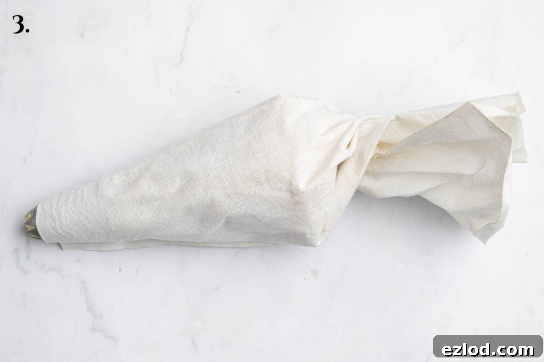 Dairy-Free Viennese Delights 7 Step 3 in making vegan Viennese whirls: The dough neatly loaded into a piping bag, ready to be shaped.