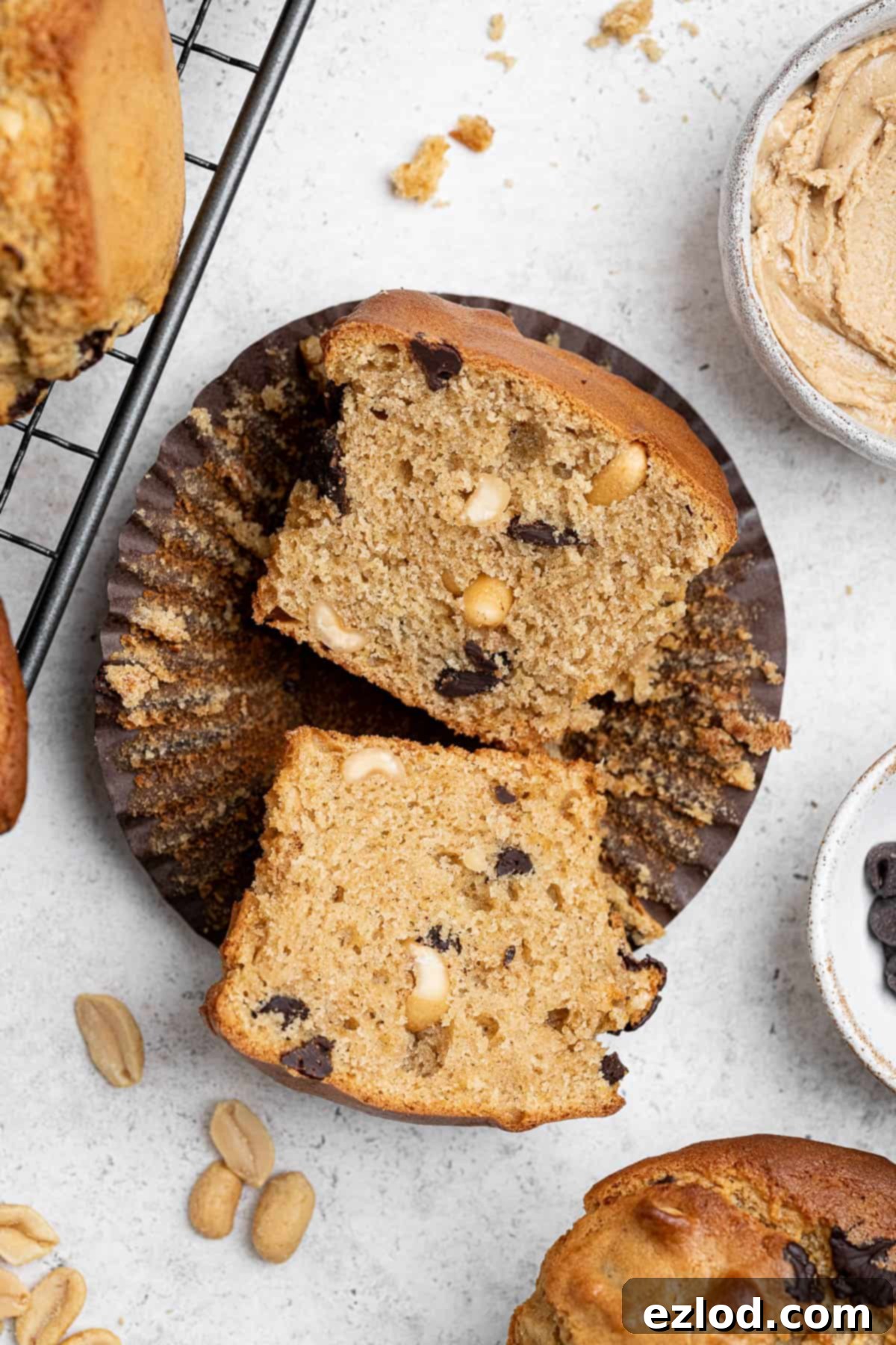 Close up of a vegan peanut butter muffin sliced in half.