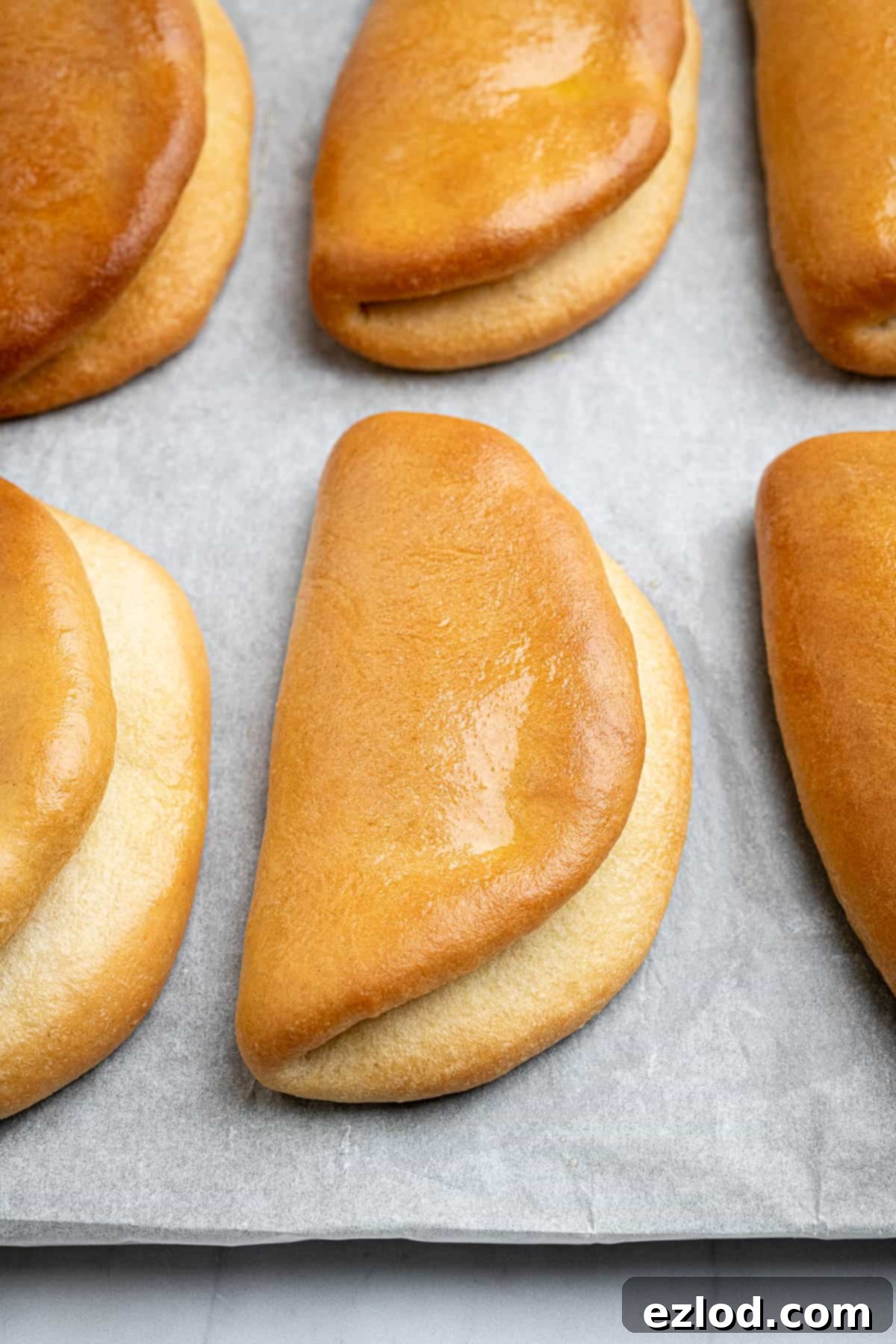 Vegan coco bread on a baking sheet.
