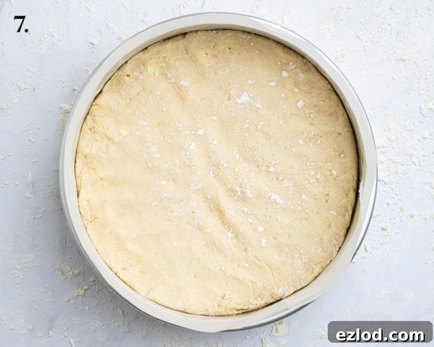 Step 7, the dough in a cake tin.