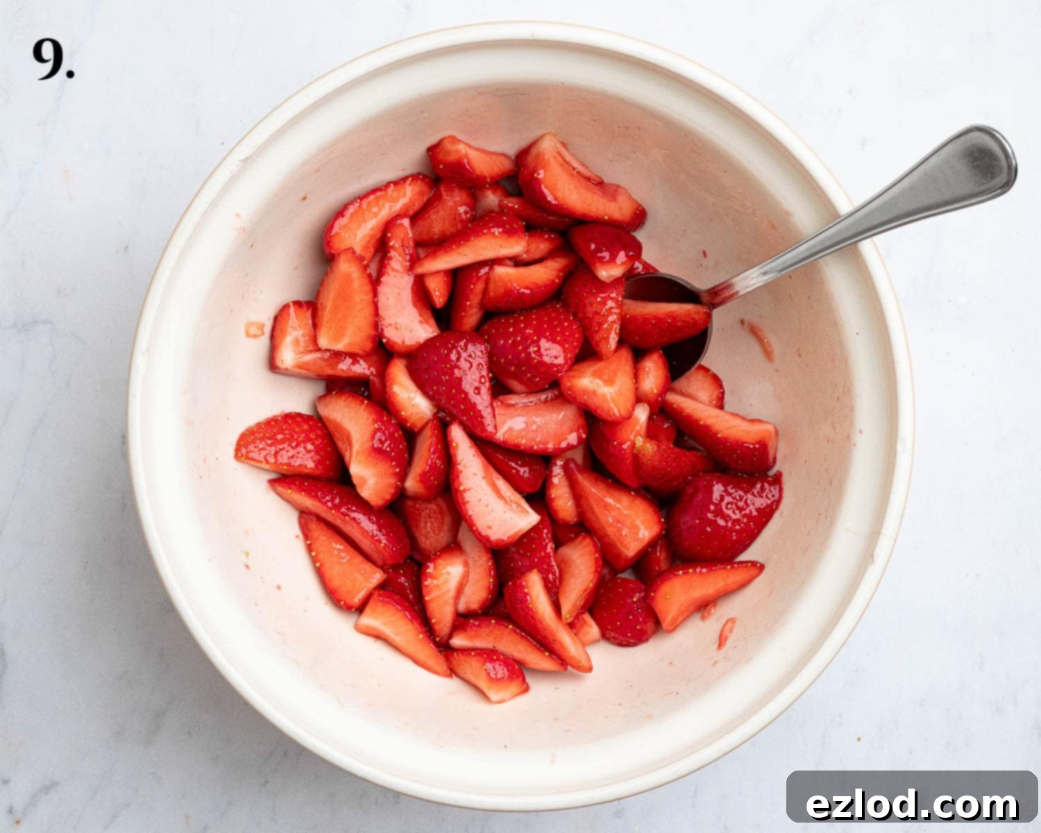 Step 9, the macerated strawberries in a bowl.